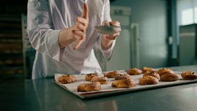 attractive baker sprinkles powdered sugar ready freshly baked hot fragrant buns baking production bakery - Powered by Shutterstock - Get 15% off with code: PIKWIZARD15