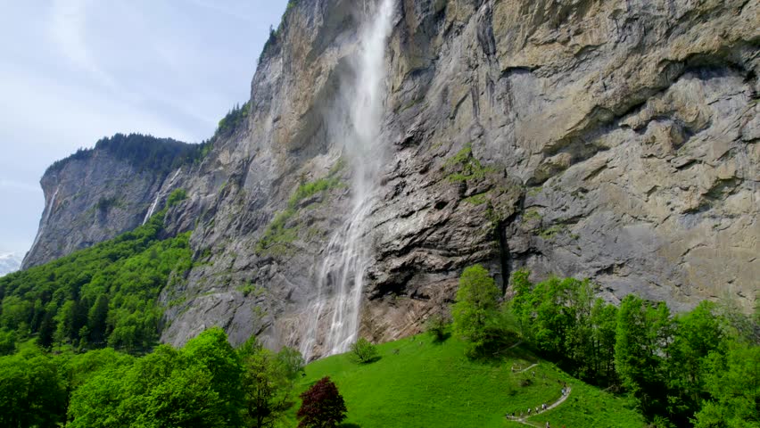 I present to you an amazing picture of the waterfall that Switzerland is famous for. An amazing and gentle picture that fascinates me from the first seconds of pre-wind shooting. Just watch and enjoy. Royalty-Free Stock Footage #1104767099