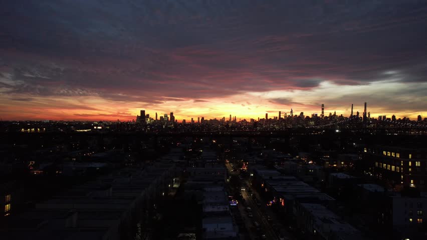 Aerial Drone View of Cityscapes Lake Stream Highline Twilight Buildings City Skyline Beautiful Breathtaking Lights Streets Dramatic Above Cinematic Dusk Sunset From Night Clouds New York City Metro