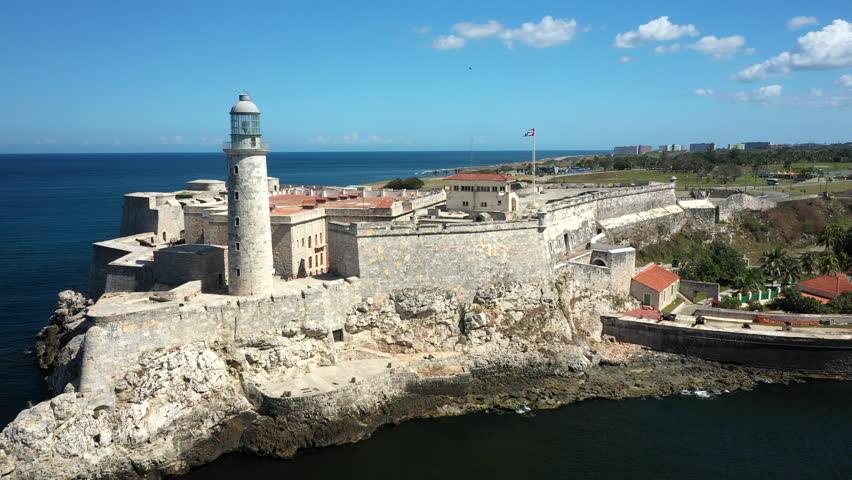 Aerial View: Faro del Castillo del Morro, Havana, Cuba Royalty-Free Stock Footage #1104771133