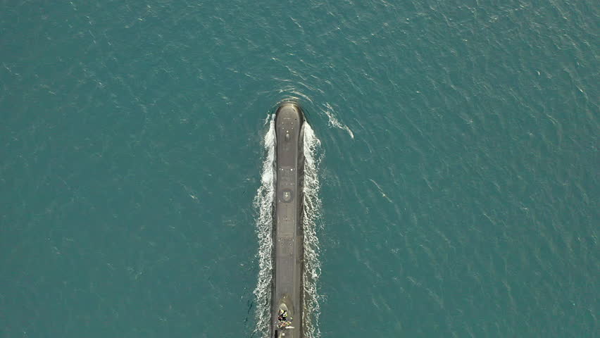 Drone, submarine boat and travel at sea for transport, naval army and military protection. Aerial view of underwater marine ship, steel fleet and sailing on ocean for battle, power and navy defence