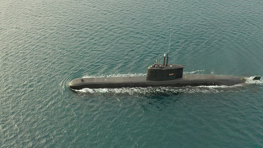 Submarine, transport and sailing at ocean, sea and travel for army, military and navy vessel. Drone of underwater marine boat, ship and steel fleet for battle, armed forces and coastal naval defence