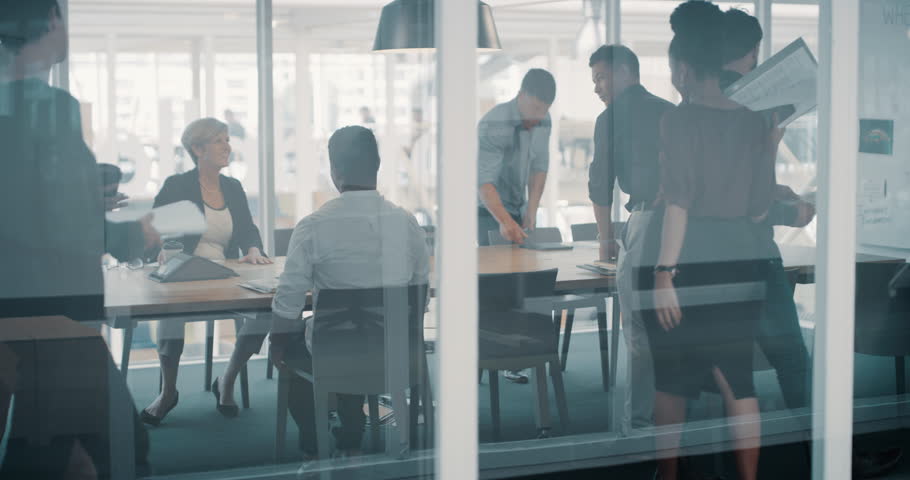 Morning, office and business people in a meeting at work for strategy, legal planning and agenda. Talking, group of lawyers and in a boardroom for a schedule, teamwork or a law firm discussion Royalty-Free Stock Footage #1104773793