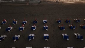 Captivating Dusk Solitude: Cinematic Drone Footage of Empty Beach Loungers in Alanya