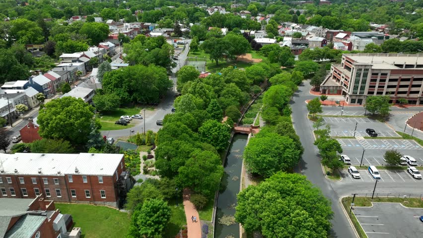 Carroll Creek Linear Park and town public pool. Aerial view on summer day in Frederick Maryland. Frederick MD.