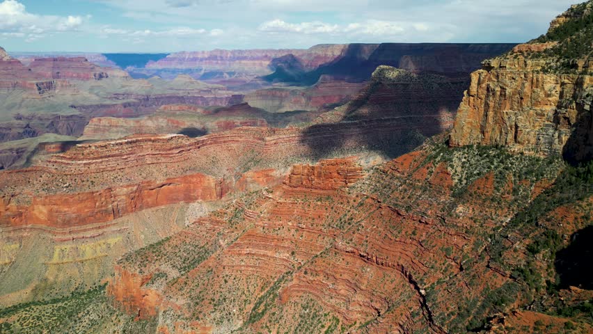 Cinematic aerial drone footage of Sunrise in Grand Canyon National Park in Arizona. A wonderful view of the grand canyon and wild forest. Aerial panorama of the Grand Canyon National Park, South Rim G