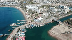 Aerial video, promenade of the Eilat city during a sunny day, Arava, Israel