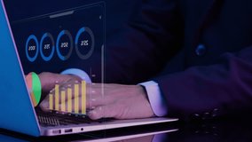 Businessman working with laptop computer, showing chart and graph icons on virtual hologram digital screen interface. Big data analytics, BI business intelligence, investment and financial concept. - Powered by Shutterstock - Get 15% off with code: PIKWIZARD15