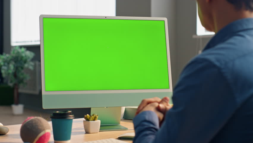 Manager talking mockup computer display at video call modern office. Closeup unknown specialist looking green screen gesturing hands at work place. Confident man designer communicating at virtual chat | Shutterstock HD Video #1104814409