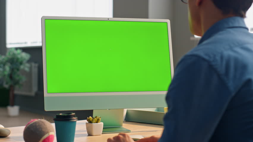 Freelancer video chatting mockup monitor in workplace. Close up unknown business consultant talking to colleagues having internet call. Businessman explaining strategy online using chromakey device | Shutterstock HD Video #1104814479