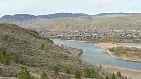 Cityscape Reflections: Glimpses of Downtown Kamloops and the Tranquil Thompson River