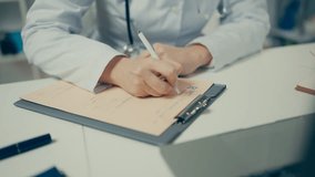 Hands of female doctor writing prescription on paper, disease treatment protocol - Powered by Shutterstock - Get 15% off with code: PIKWIZARD15