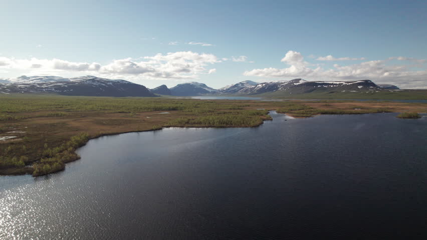 Aerial View of a Beautiful Serene Swedish Mountain and Lake Landscape at Sunset, Lapland, Kungsleden Trail, Sitojaure