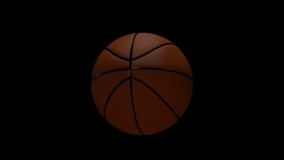 Basketball ball rotating on black background. Sports equipment, loop-able spinning ball, suitable for video overlays. Basketball games concept.