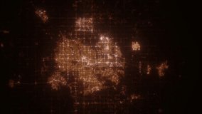 Edmonton (Canada) top view at night. Aerial view on modern city from space. Camera is flying above the city, moving forward. Vertical video. The north is on the left side
