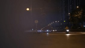 Dynamic Hanoi street: night, vehicle, urban, cityscape, motion, vibrant, blur, relax background video