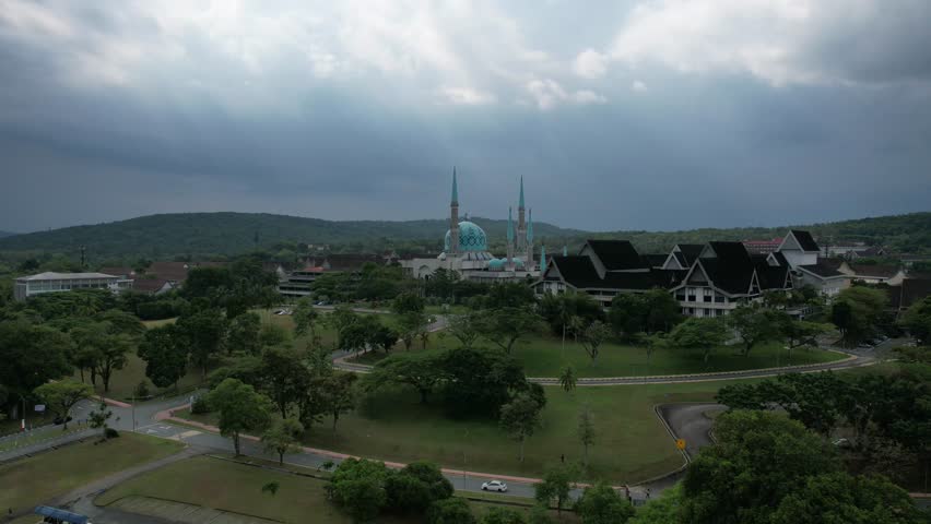 A hyprlapse of Universiti Teknologi Malaysia during cloudy and stormy day | Shutterstock HD Video #1104844113