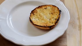Toasted English muffin with egg and onion healthy breakfast 4k resolution video 