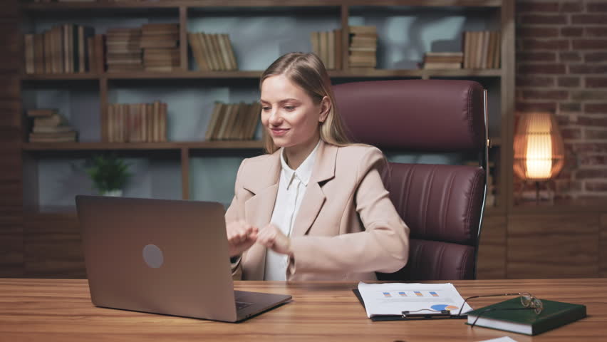 Ambitious lady feeling happy because of getting possibility to take part in international conference of young business people abroad. Euphoric woman celebrating success and showing gesture of winner. Royalty-Free Stock Footage #1104845983