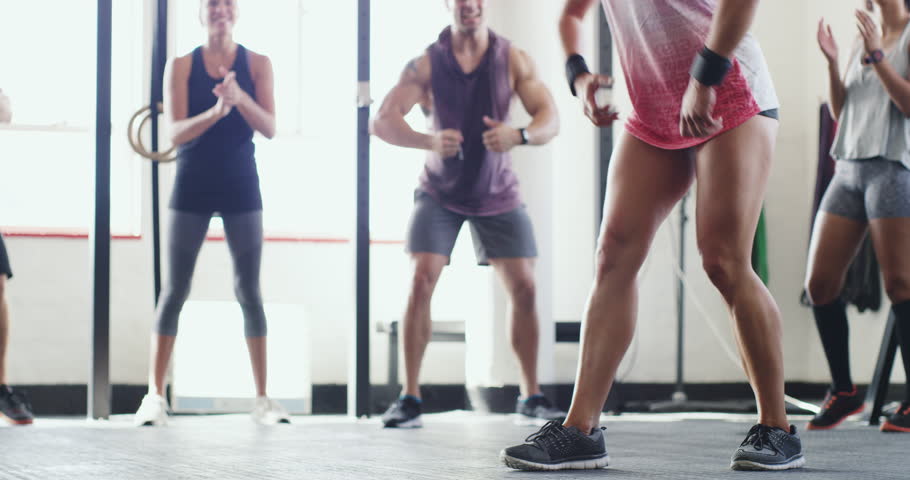 Celebrate, motivation and fitness group excited for health achievement or goal by woman in celebration of her training. Support, applause and people happy and in support of teamwork in a workout gym | Shutterstock HD Video #1104849599