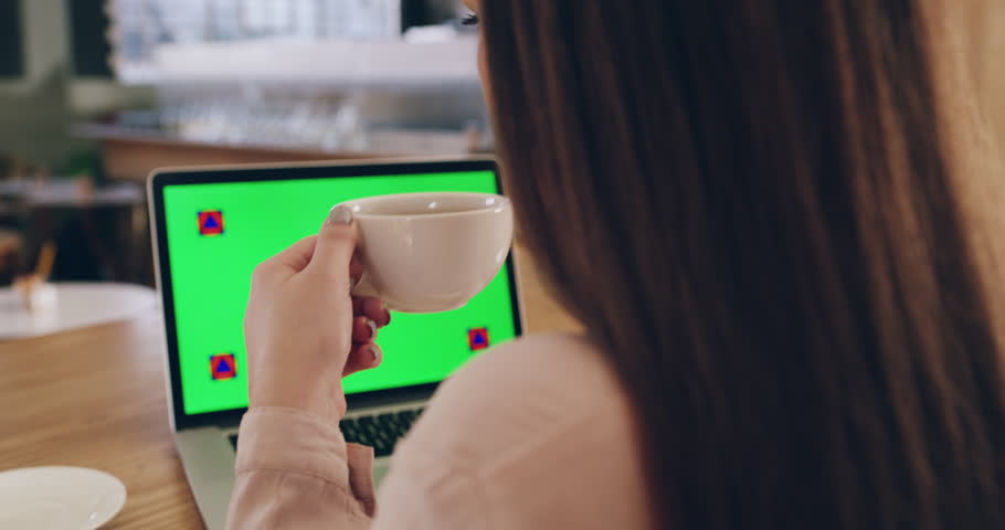 Woman, laptop and green screen drinking coffee at cafe for online advertising or marketing with tracking markers. Female person or freelancer in remote work on computer with chromakey mockup display | Shutterstock HD Video #1104849629