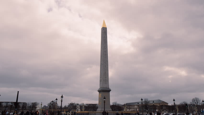 Luxor Obelisk Against Cloudy Sky In Paris, France - wide