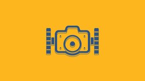 Blue Photo camera for diver icon isolated on orange background. Foto camera icon. Diving underwater equipment. 4K Video motion graphic animation .