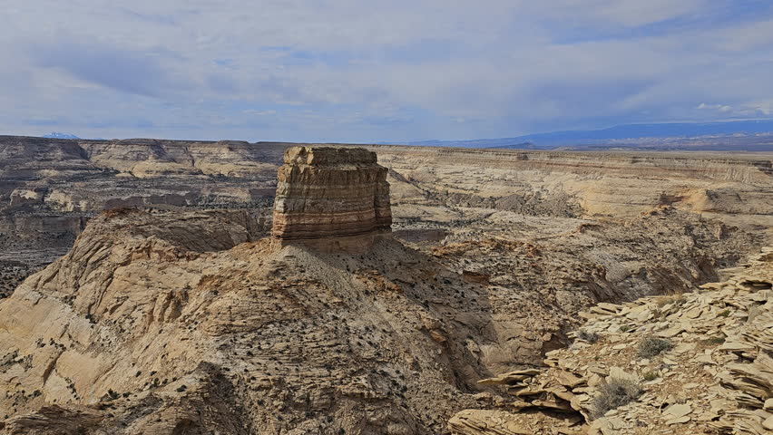 Multi layer rock tower in rugged canyon area of the Colorado Plateau in south central Utah-Pan