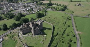 Spectacular 4K aerial video of flying above ancient medieval castle with views around