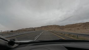  drive on Israel's desert  - 90 Road, capturing stunning video from a car's front window near the Dead Sea. A journey of awe and tranquility.