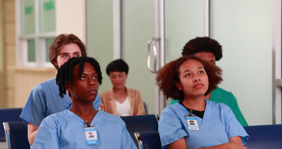 Diverse group of young students  seminar in lecture hall. Training courses. Medicine medical and health care concept Royalty-Free Stock Footage #1104902047