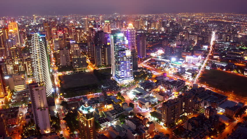 Aerial skyline of Downtown Taichung, a vibrant metropolis in central Taiwan, with modern high-rise office towers booming in the 7th Redevelopment Zone and city lights dazzling at night (in hyperlapse) Royalty-Free Stock Footage #1104915377