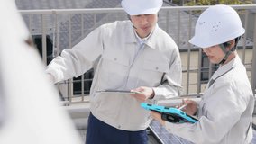 Workers inspecting building equipment with tablet PC. Maintenance and inspection. - Powered by Shutterstock - Get 15% off with code: PIKWIZARD15