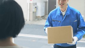 Delivery staff delivering packages to home. - Powered by Shutterstock - Get 15% off with code: PIKWIZARD15