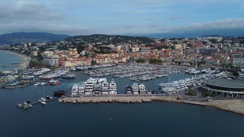 Wide angle establishing drone shot Cannes city and port in France Royalty-Free Stock Footage #1104935267