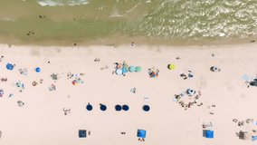 Gulf Shores, Alabama beach with drone video moving overhead.