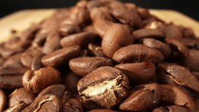 The macro video of beautiful coffee beans allows viewers to witness the mesmerizing world that lies within these seemingly ordinary seeds. It highlights the exquisite details, textures, and colors
