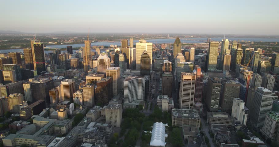 Aerial view toward downtown Montreal, sunny, summer evening in Quebec, Canada