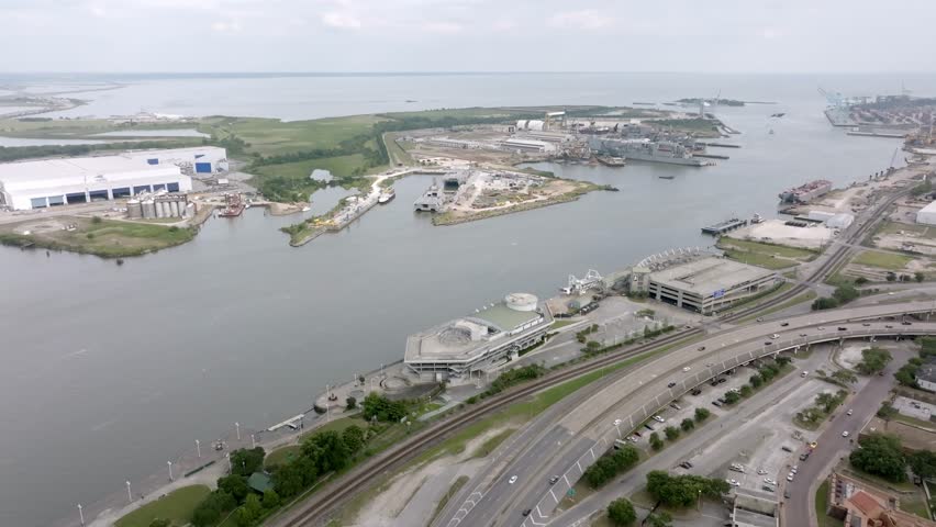 Wide view of Mobile Bay in Mobile, Alabama with drone video moving in.