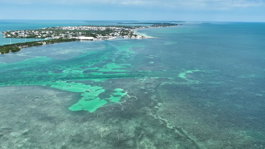 Aerial shot of the Florida Keys and the highway the connects them. Royalty-Free Stock Footage #1104940267