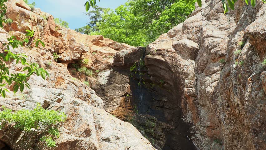 Sunny view of the Post Oak Waterfall landscape of Wichita Mountains National Wildlife Refuge at Oklahoma