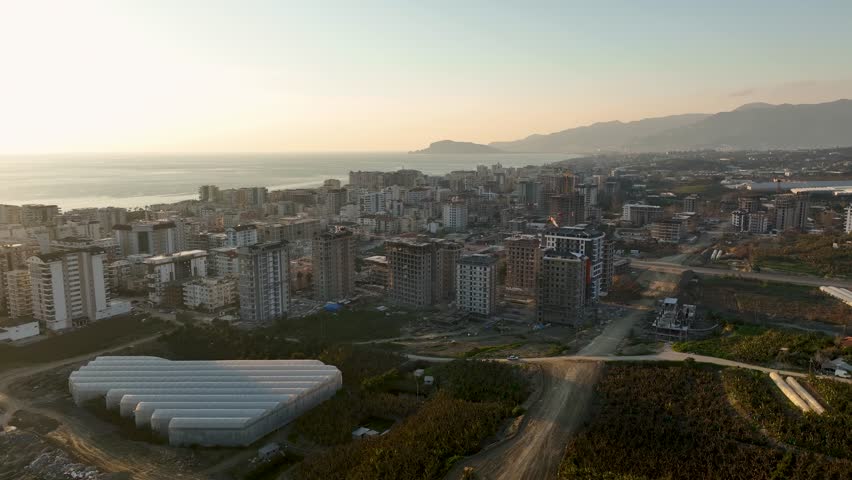 Coastal Charm Unveiled: Cinematic Drone Captures the Panorama of a Charming Seaside Town