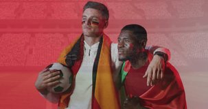 Animation of confetti over diverse footballers watching game with flags of germany and portugal. Sports, competition, winning and celebration concept digitally generated video.