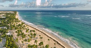 Sunrise aerial view of tropical caribbean sea and beach resort Punta Cana, Dominicana, Dominican Republic 4K video