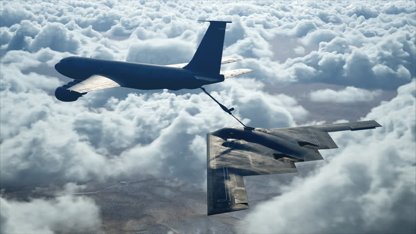 B-2 SPIRIT SUPERSONIC STEALTH BOMBER REFUELING IN AIR 