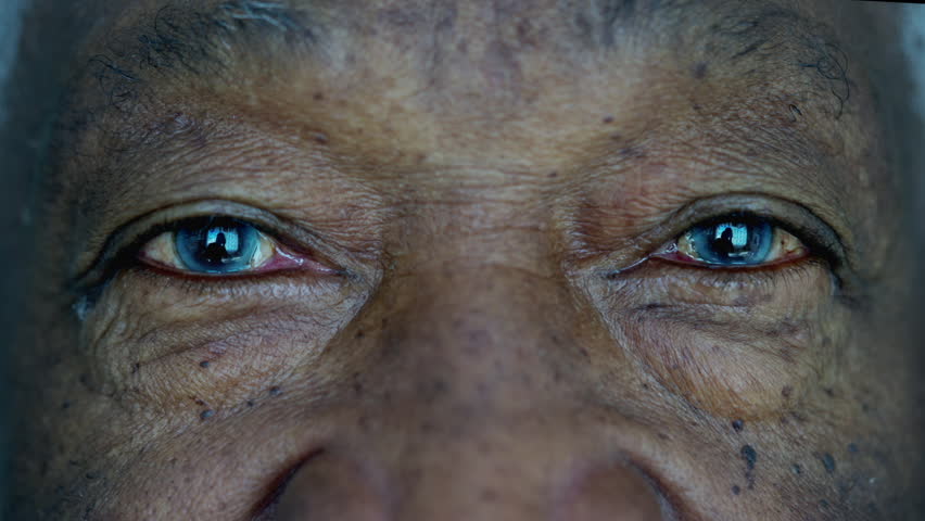 Close-up Shot Of Man's Eye. Man With Blue Eyes. Stock Photo