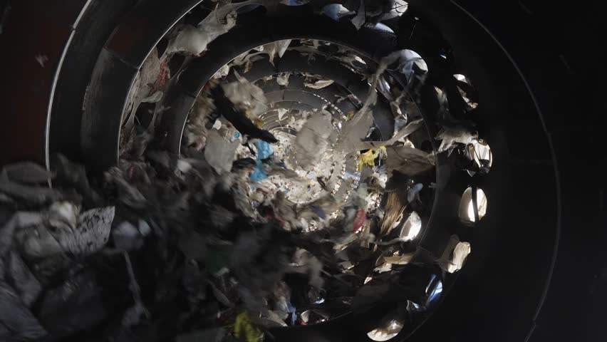 Garbage Recycling Factory, not compostable home equipment, aluminium cans, Plastic cubes for recycle Plant, rubbish warehouse collection. Preparation of recyclables for recycling | Shutterstock HD Video #1104982697