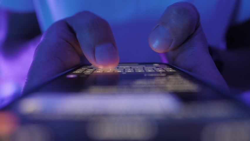 Woman chatting online on smartphone macro close up, typing text message, touching touchscreen keyboard, using messenger application. Female holding mobile phone, close up, swiping social media. 