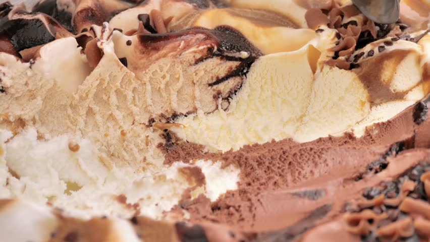 Slow motion Close up Ice cream Chocolate Chip scooped out from container with a spoon, Food concept. Royalty-Free Stock Footage #1104988549