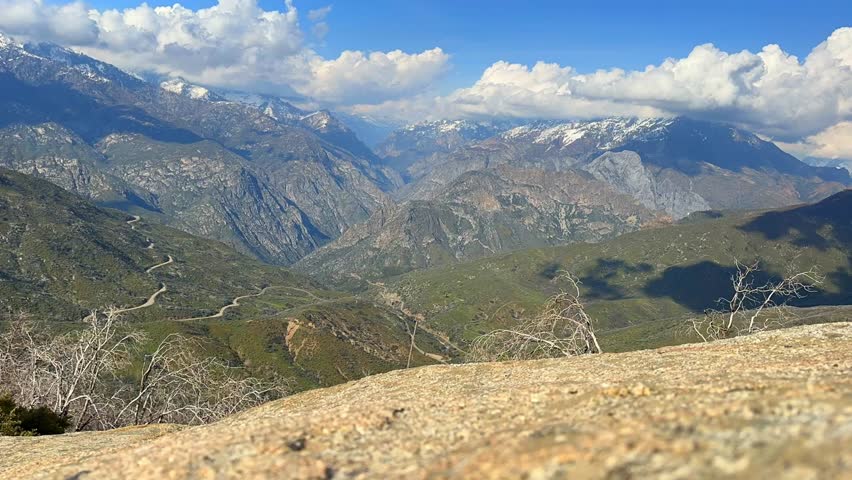 time lapse of mountain peaks on beautiful sunny day in Kings Canyon California